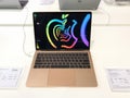 Macbook air model 2019 gold color computer showing on the table at istudio Royalty Free Stock Photo