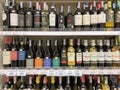 Many type of wines ready for sale in the supermarket shelf