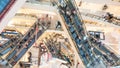 Bangkok, Thailand - Oct 23, 2019: Top view motion blurred of crowded Asian people using escalators in modern shopping mall