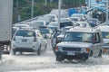 BANGKOK, THAILAND - OCTOBER 31, 2011 Car stuck in mud and splash, concept of natural disaster flood on all road.