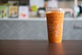 Bangkok, Thailand - October 23, 2020 : Iced Thai milk tea in container that can be decomposed naturally in Inthanin coffee shops
