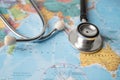 Stethoscope on USA America world globe map background