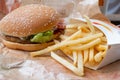 Bangkok, Thailand - October 11th, 2019 : Closed up of Burger King's french fries and burger on brown paper