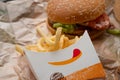Bangkok, Thailand - October 11th, 2019 : Closed up of Burger King's french fries and burger on brown paper