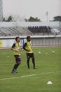 BANGKOK THAILAND- OCTOBER 5: Unidentified football players warm