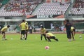 BANGKOK THAILAND- OCTOBER 5: Unidentified football players warm