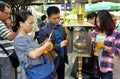 Bangkok, Thailand: People Lighting Incense Sticks Royalty Free Stock Photo