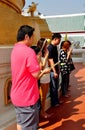 Bangkok, Thailand: People Praying at Temple