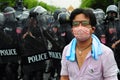 Bangkok/Thailand - 11 24 2012: Riot police face protesters at Royal Plaza Royalty Free Stock Photo