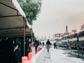 Bangkok , Thailand - sanam luang on September 2017 : After raining Thai people wear black cloth and stand inside tent wait for mo