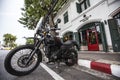Bangkok, Thailand - 30 Sep 2020: black royal enfield indian motorcycle manufacturing brand parking front of coffee shop cafÃÂ©
