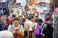 Crowd of people walking in market