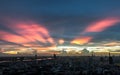 Fantastic colorful sunset sky over the bangkok city skyscrapers with bright glowing lights at dusk Royalty Free Stock Photo