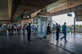 Bangkok, Thailand - 26 Sep 2020, Local Passenger pass the gate at Airport Rail Link, Ladkrabang Station with Security Guard checks