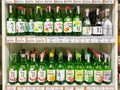 Many bottles of Soju on shelf for sale