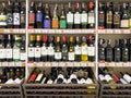 Many bottles of Wines on the shelf for sale in the Foodland supermarket