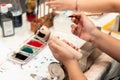 Bangkok, Thailand - SEP 01, 2018 : people making Japanese Kokeshi dolls in the art workshop class, Japan traditional adorable