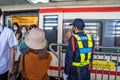 Bangkok, Thailand - 26 Sep 2020, The Security Airport Rail Link Staff on duty to control passenger between train and platform at