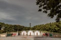 Three Traditional chinese graves are at Chinese cemetery are against the modern building and sky background Royalty Free Stock Photo