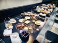 BANGKOK, THAILAND - SEPTEMBER 09: Customers leave dirty tables in Shabu Chain restaurant Bangkhae store after dining in Bangkok on