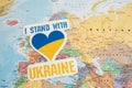 Bangkok, Thailand - September 1, 2022 I stand with Ukraine text with heart flag on world map, stop war with Russia concept Royalty Free Stock Photo