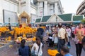 BANGKOK, THAILAND - SEPTEMBER 26, 2015: People are paying respect to the Erawan Shrine, which is a Hindu shrine housing a statue Royalty Free Stock Photo