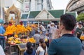 BANGKOK, THAILAND - SEPTEMBER 26, 2015: People are paying respect to the Erawan Shrine, which is a Hindu shrine housing a statue Royalty Free Stock Photo