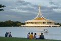 People take a rest on grass at Rama IX Park Royalty Free Stock Photo