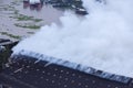 Smoke in burning industrial warehouse or storehouse industrial hangar from burned roof at ratburana district.