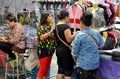 Bangkok, Thailand: Three Women Shopping at Outdoor Market