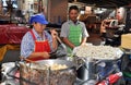 Bangkok, Thailand: Two vendors Selling Street Food