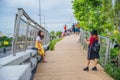 Unacquainted people on chao phraya skypark.