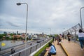 Unacquainted people on chao phraya skypark.