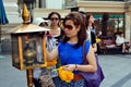 Bangkok, Thailand: Woman Lighting Incense Sticks