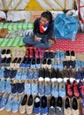 Bangkok, Thailand: Woman Selling Footwear