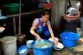 Bangkok, Thailand: Woman Washing Dishes Royalty Free Stock Photo