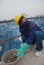 Bangkok, Thailand, women workers on the top of a building site Royalty Free Stock Photo