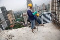 Bangkok, Thailand, women workers on the top of a building site Royalty Free Stock Photo