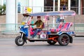 Bangkok Tuk-tuk taxi tricycle rides on the road. Royalty Free Stock Photo
