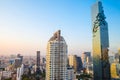 Bangkok twilight cityscape of Mahanakorn tower with sun light