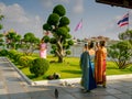 Bangkok, Thailand - March 1, 2025 Thai women photograph each other at the Wat Arun Temple of Dawn Royalty Free Stock Photo