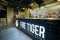 BANGKOKTHAILAND-JULY 10 : Fire Tiger by Seoulcial Club Coffee shop and bubble tea front and inside the shop logo in Siam Square