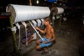 Yarn factory workers are rechecking newly made white yarn at Narsingdi  Bangladesh Royalty Free Stock Photo