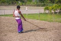 A farmer loosens the soil with his hand-made machine at Savar  Dhaka Royalty Free Stock Photo