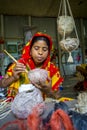 Handicraft maker women are making on a showpiece bird nests using on pineapple fiber at Madhupur, Royalty Free Stock Photo