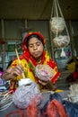 Handicraft maker women are making on a showpiece bird nests using on pineapple fiber at Madhupur, Royalty Free Stock Photo