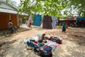 Bangladesh - May 19, 2019: A Rural village Businessman selling cloth and products to hang up on the tree trunk, Meherpur,