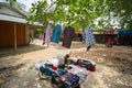 Bangladesh - May 19, 2019: A Rural village Businessman selling cloth and products to hang up on the tree trunk, Meherpur,