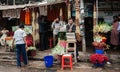 Bangladesh people and local flower shop on street side in Dhaka city