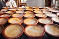 Bangladesh street food. Sweet Mishti Doi in ceramic clay pot